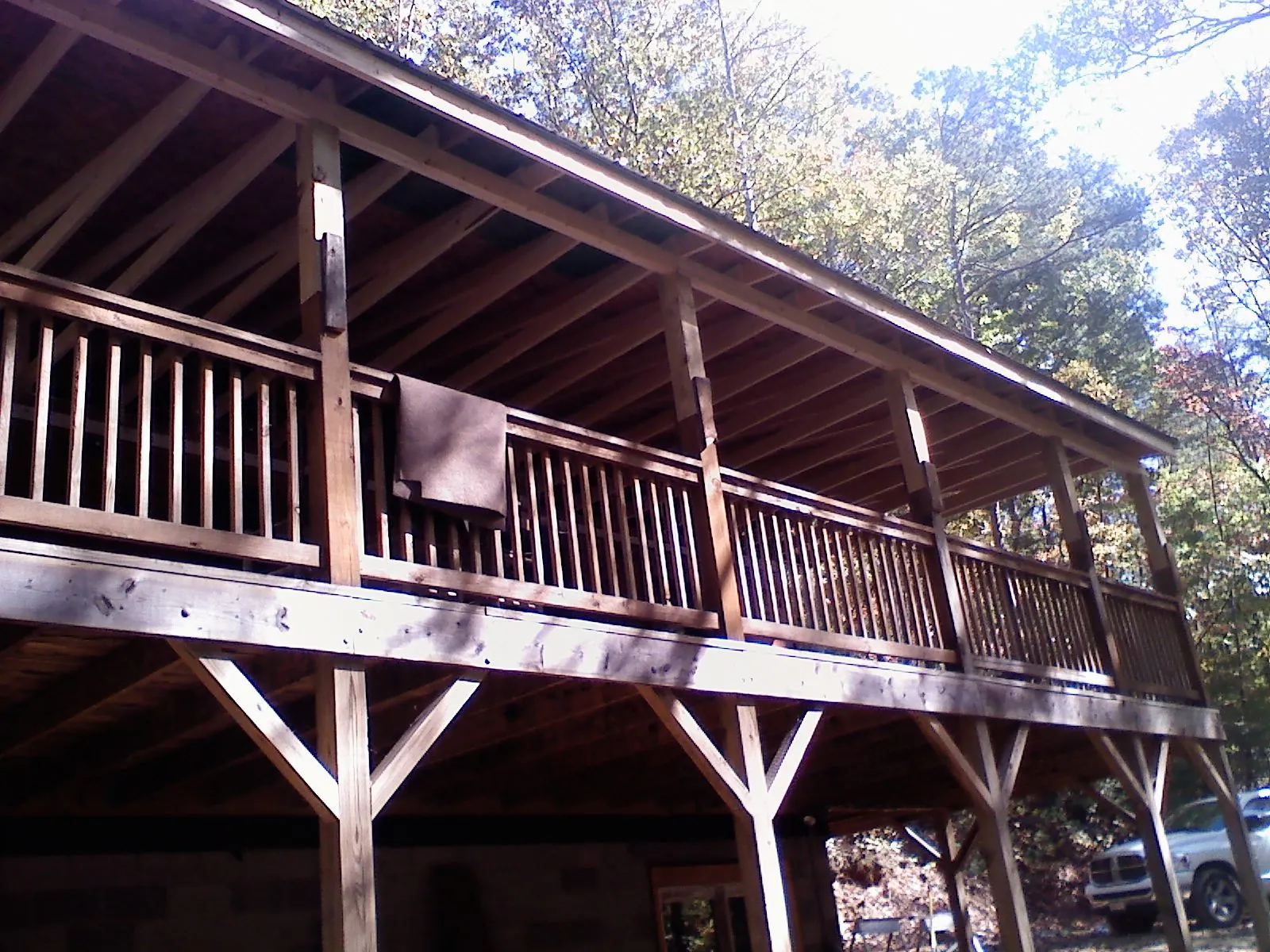 Timber framing under a new elevated porch and deck — Roof Leak Repair in Moosic by Roofing Brothers